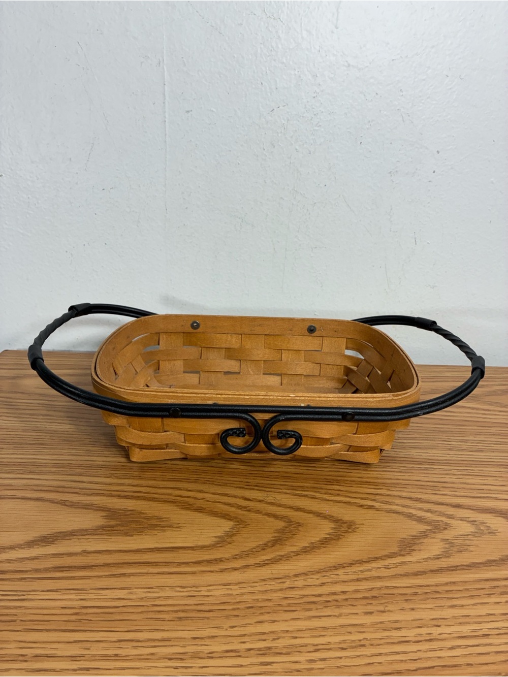 Longaberger Tan Woven Basket with Black Metal Handles